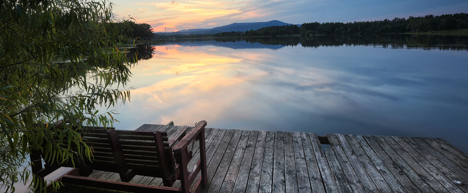 Beautiful landscape of water near a doc