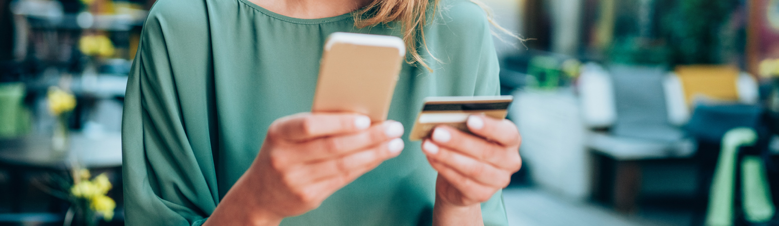 a person making an online purchase using a debit or credit card.