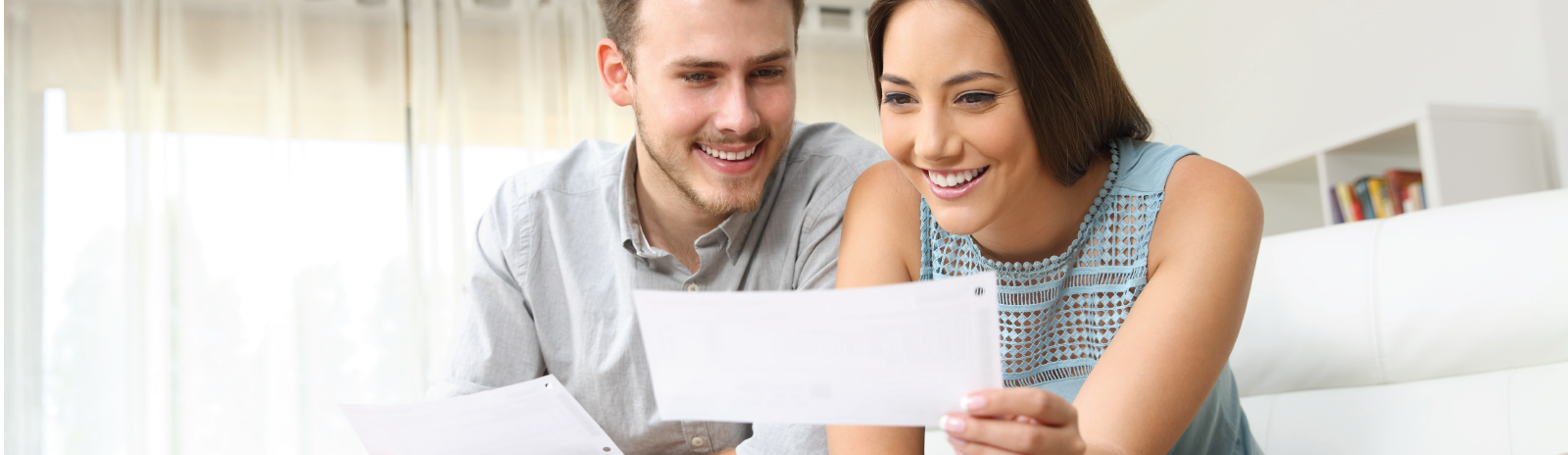Couple looking at check